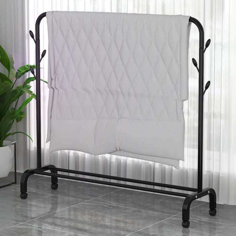 挂衣架/衣帽架/落地衣架卧室/五金/衣服白底实物图