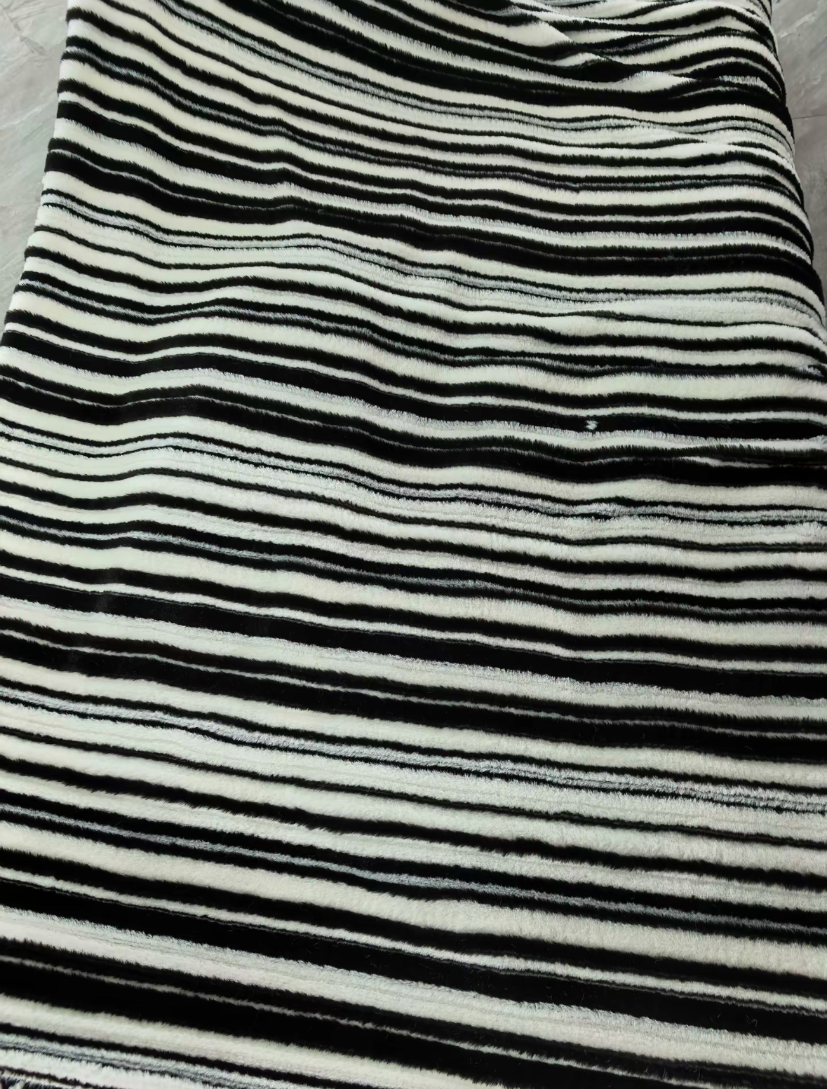 Junbao Printing and Dyeing's weft knitted three-layer jacquard rabbit fleece fabric is available in large quantities for export wholesale Application Scenario