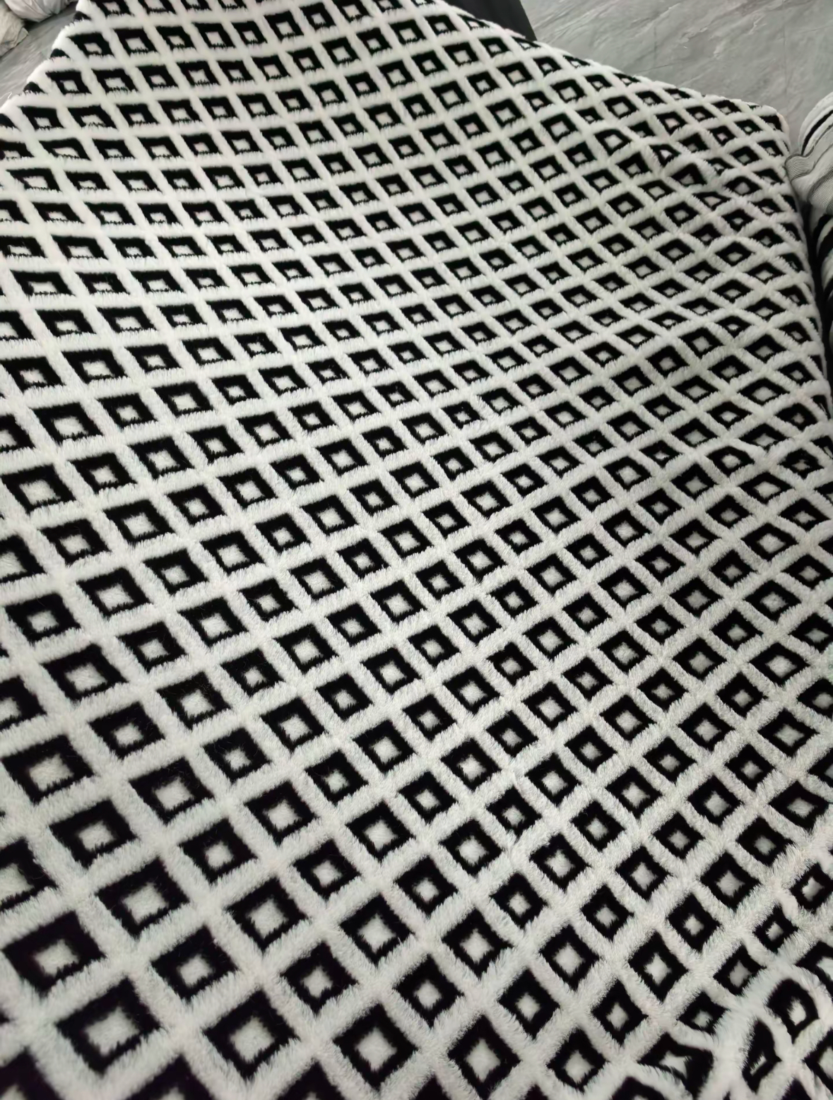Junbao Printing and Dyeing's weft knitted three-layer jacquard rabbit fleece fabric is available in large quantities for export wholesale