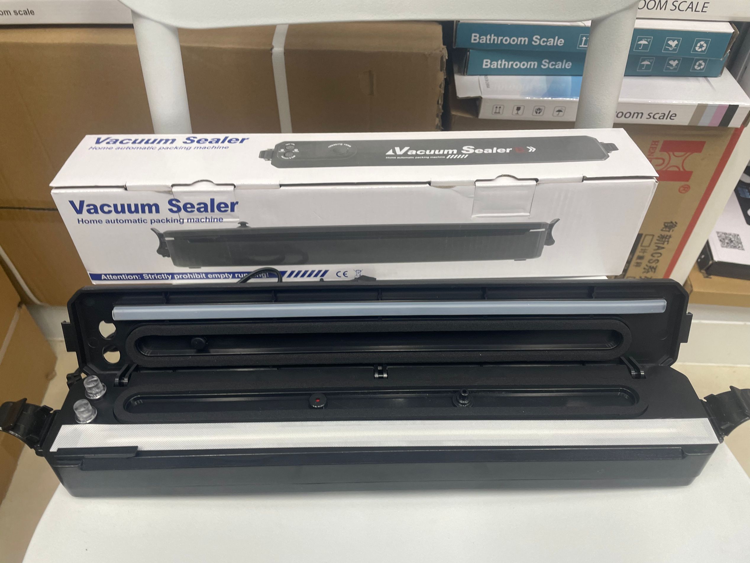 Vacuum sealing machine, household fully automatic plastic sealing machine, food packaging machine, snack sealing small tool, small preservation machine details Picture