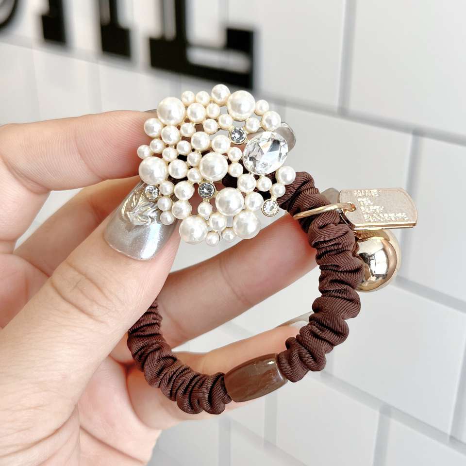 The new wholesale small fragrance air quality pearl large intestine hair band is simple and elegant. Girls can tie their hair at the back of their heads to decorate their hair with a hair tie detail image 3