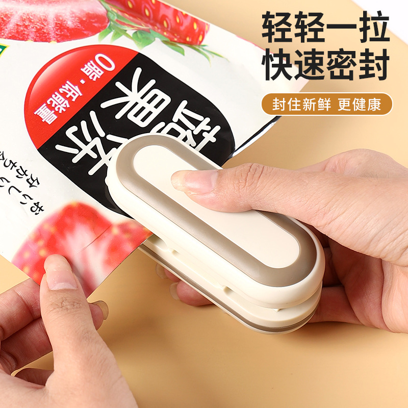 Y91-00203 Snack sealing machine Small mini plastic sealing machine packaging household plastic bag food preservation full figure