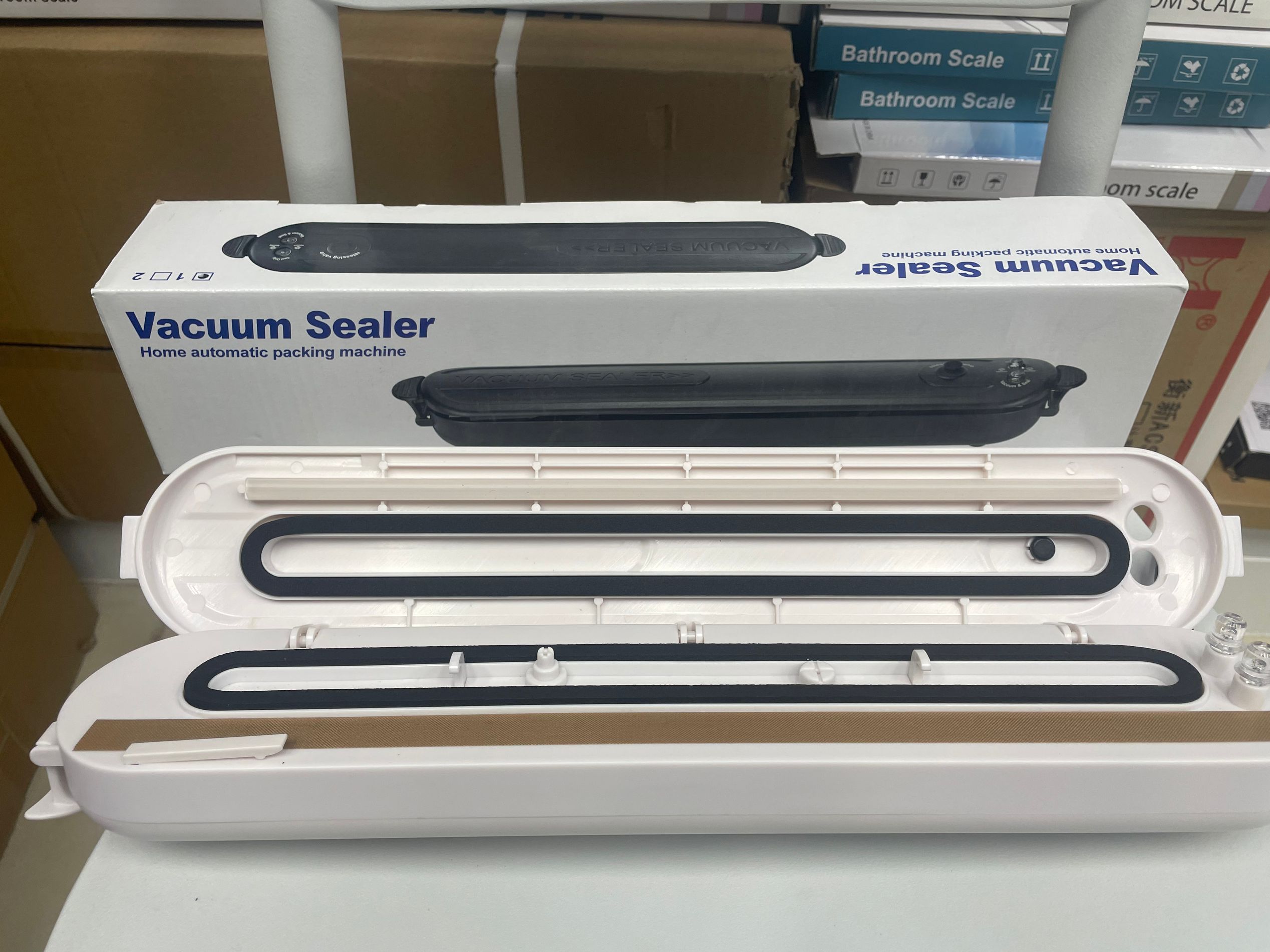 Vacuum sealing machine, household fully automatic plastic sealing machine, food packaging machine, snack sealing, small tools, small preservation machine for preservation details Picture