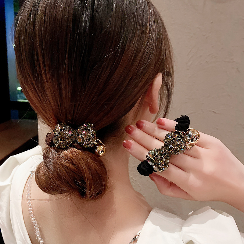 A new retro and fashionable Korean style with a bow tie full of diamonds and a French large intestine hair band. A simple ponytail for women with hair bands detail image 3