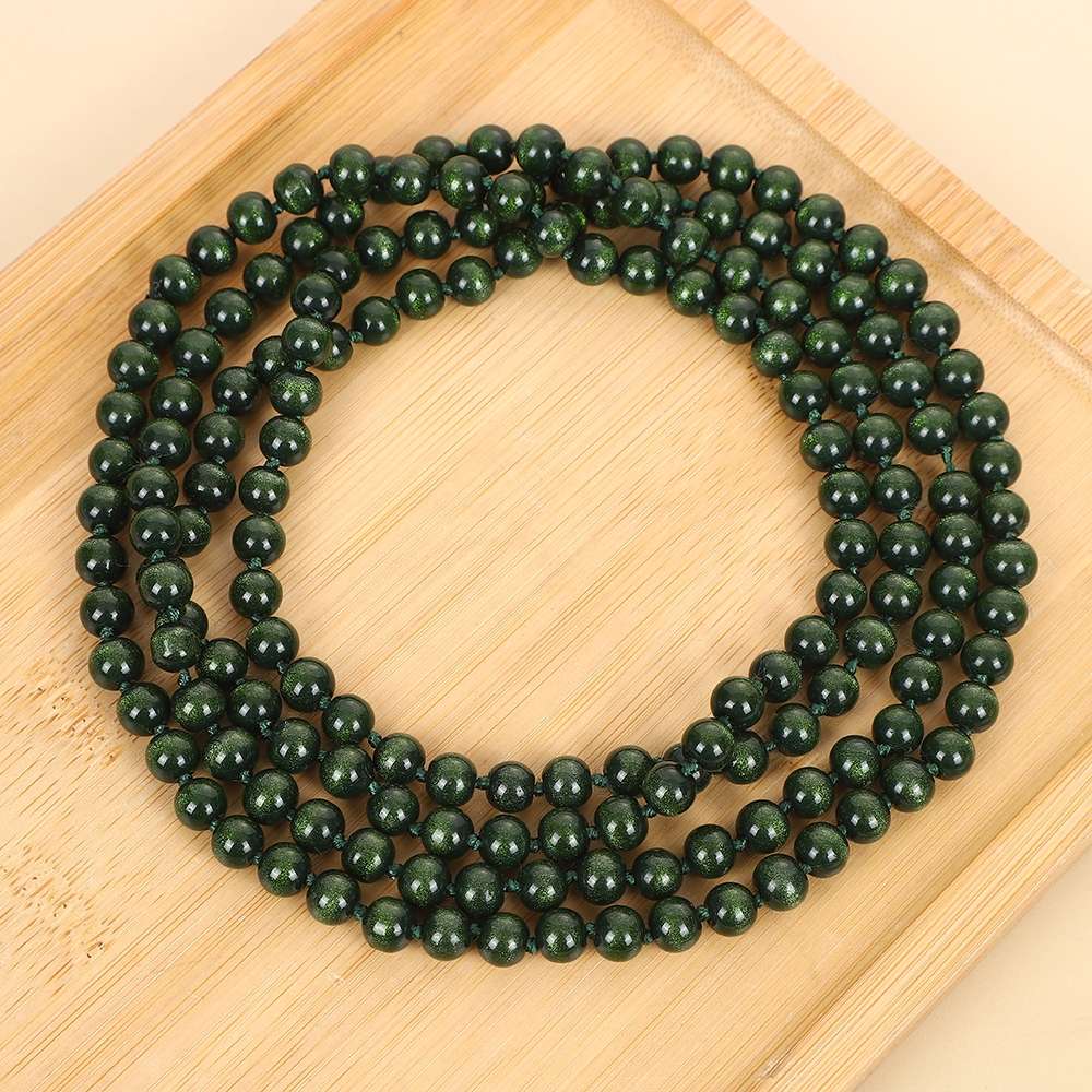 New imitation cat's eye green sand gold women's knotted necklace, multi-layered long sweater chain, clothing women's accessories wholesale necklace Specification image