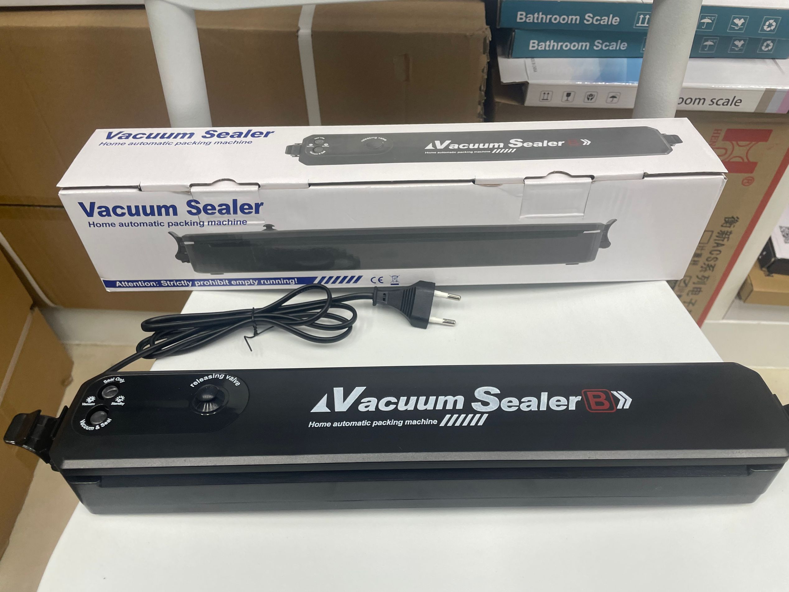 Máquina de sellado al vacío máquina de plastificación automática para el hogar máquina de envasado de alimentos máquina de sellado de snacks gadgets máquina de conservación pequeña