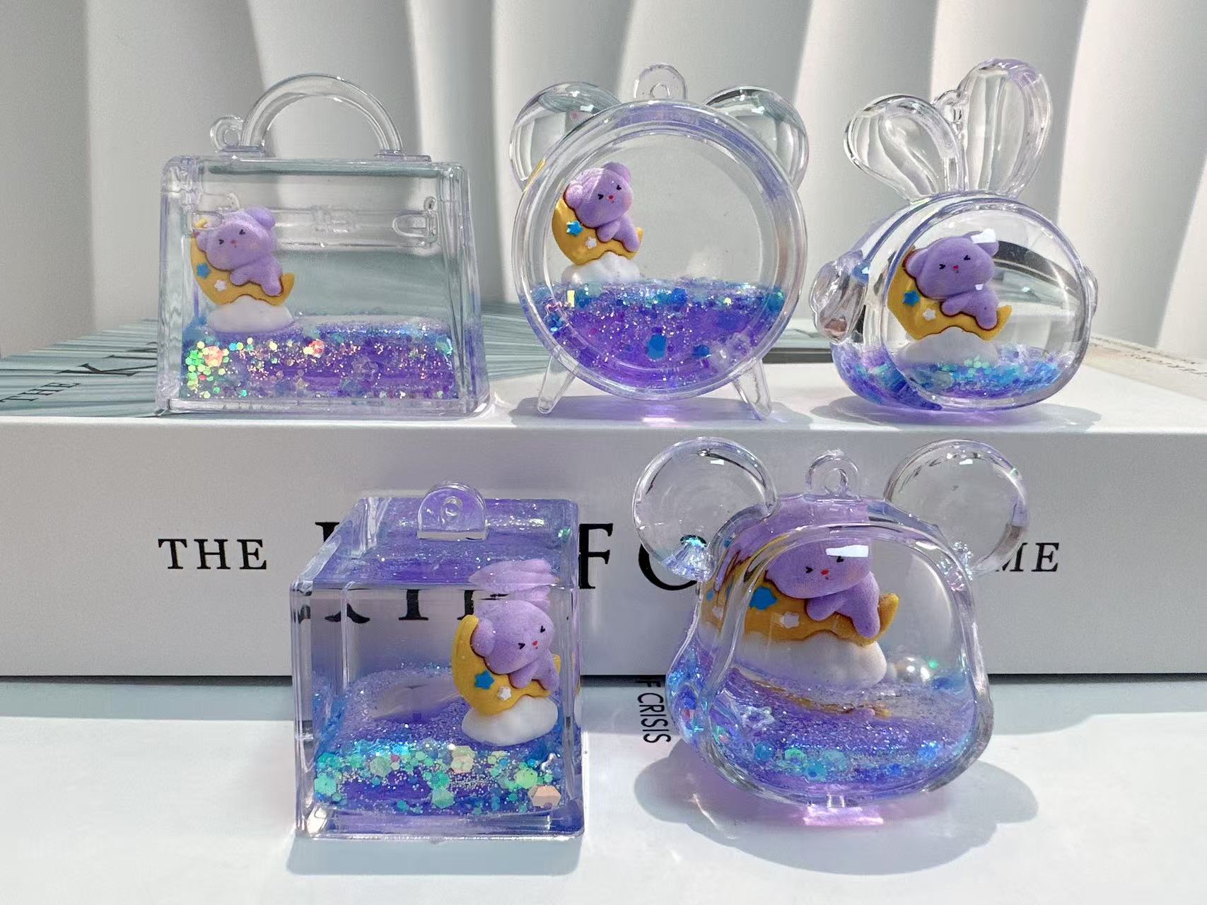 发光奶牛小汽车玩具钥匙扣 流沙瓶钥匙扣 卡皮巴拉注油瓶挂件钥匙扣流沙瓶白底实物图