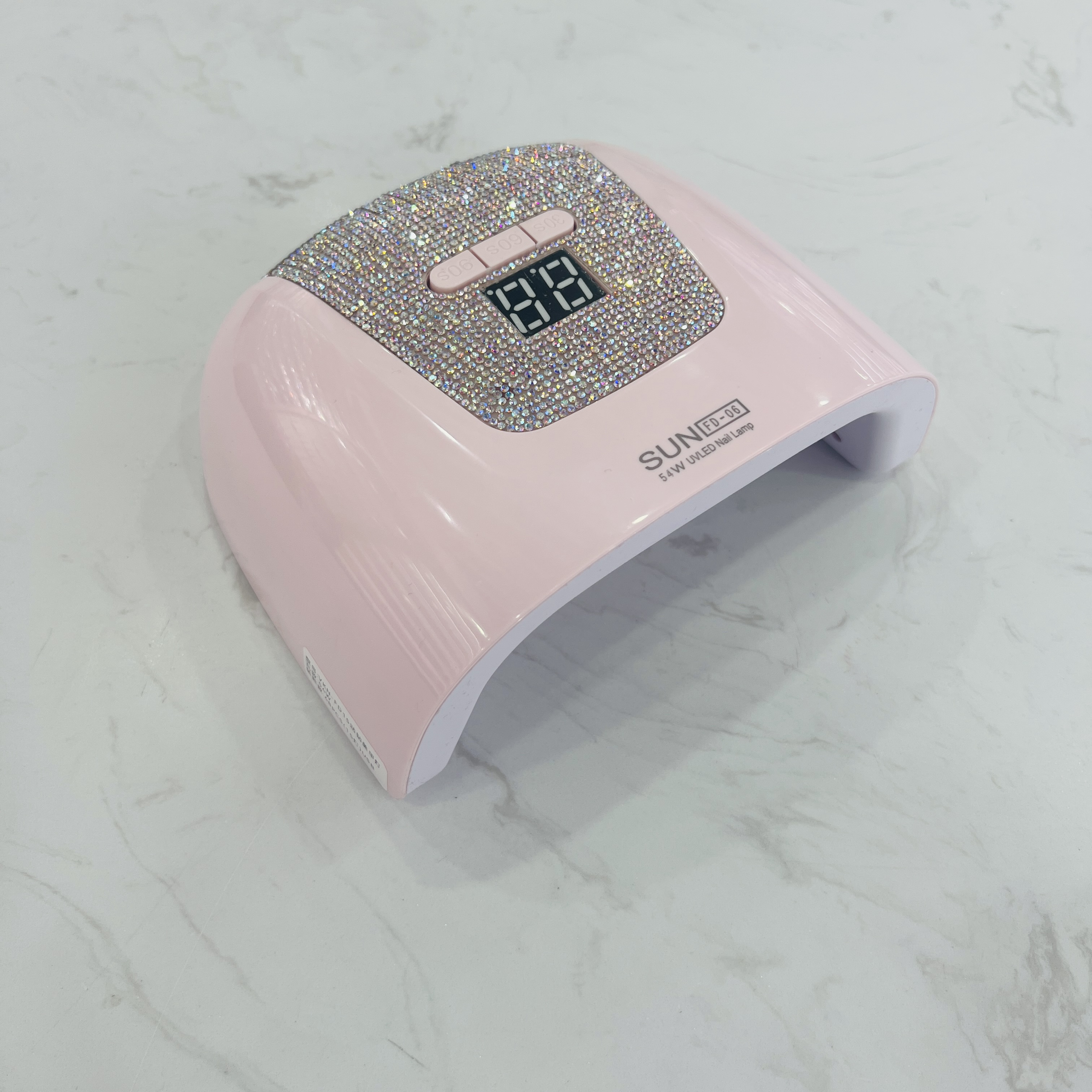 The new USB nail lamp with a mini portable 54W nail baking lamp features intelligent sensing and 3-time setting full figure