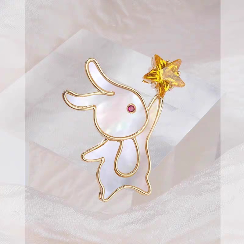 Broche conejo pequeño con estrellas amarillas Specification image