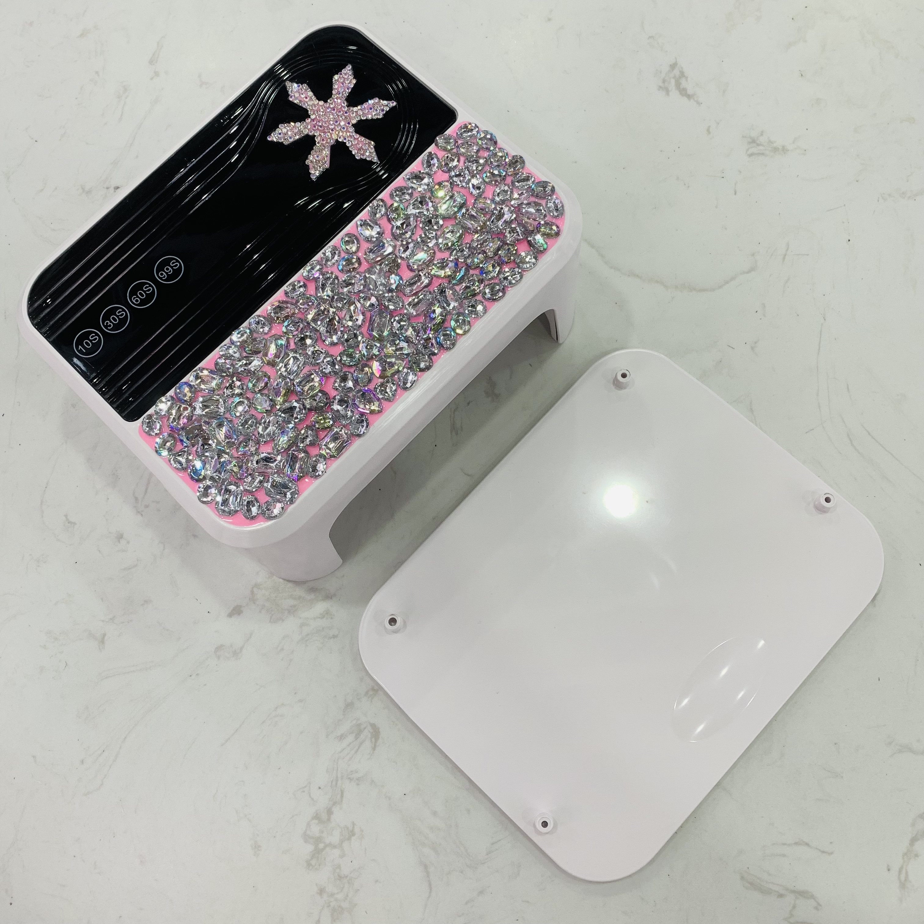 The new 288W high-power nail lamp, a two-in-one nail baking lamp with a diamond-attaching design, features an intelligent sensor with 45 beads Item Picture