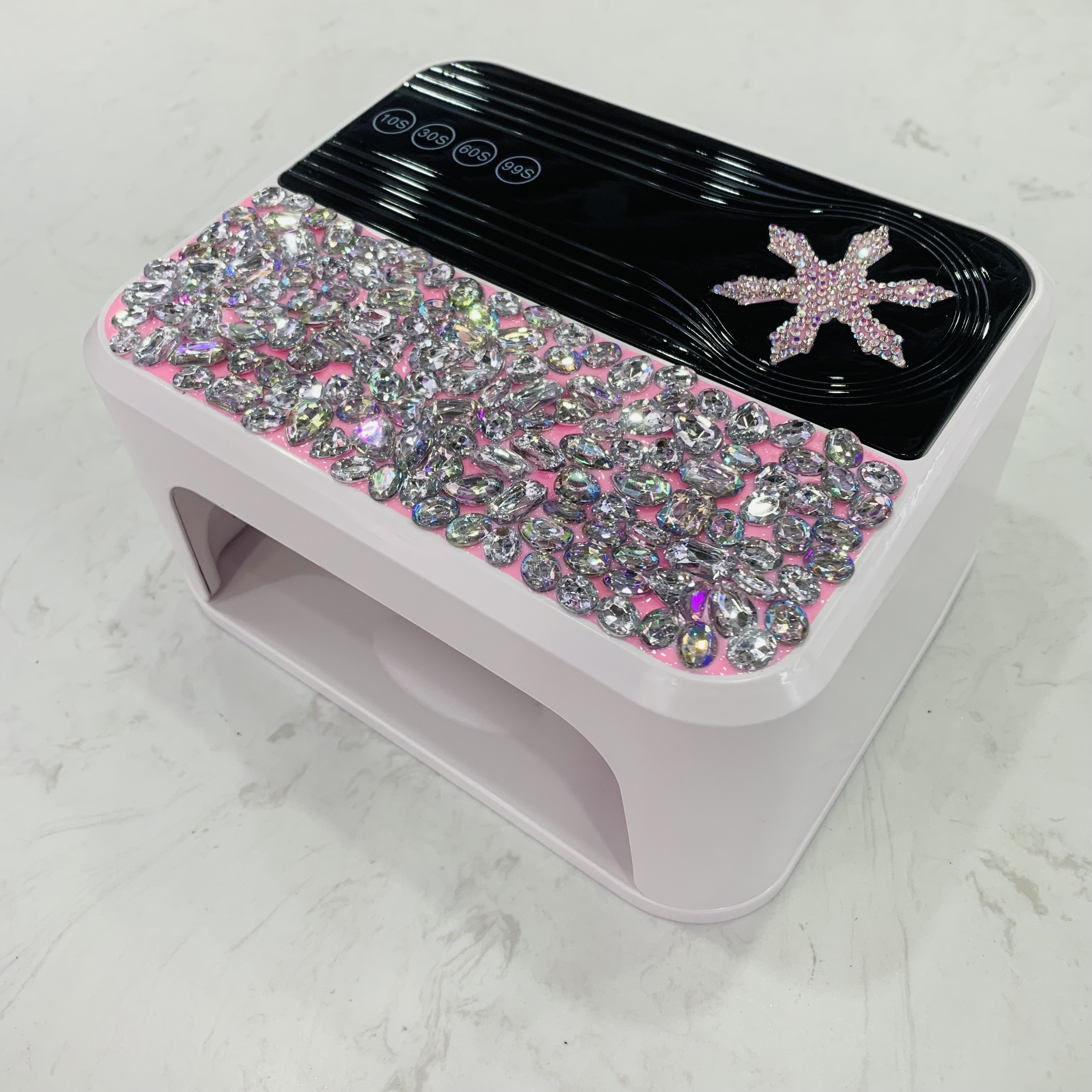 The new 288W high-power nail lamp, a two-in-one nail baking lamp with a diamond-attaching design, features an intelligent sensor with 45 beads full figure