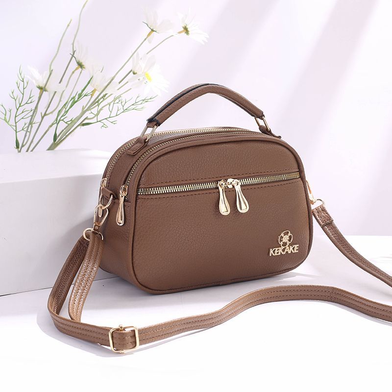 包包女2025女士新款软皮包包妈妈包多层百搭单肩斜跨包中年妈妈包背包白底实物图