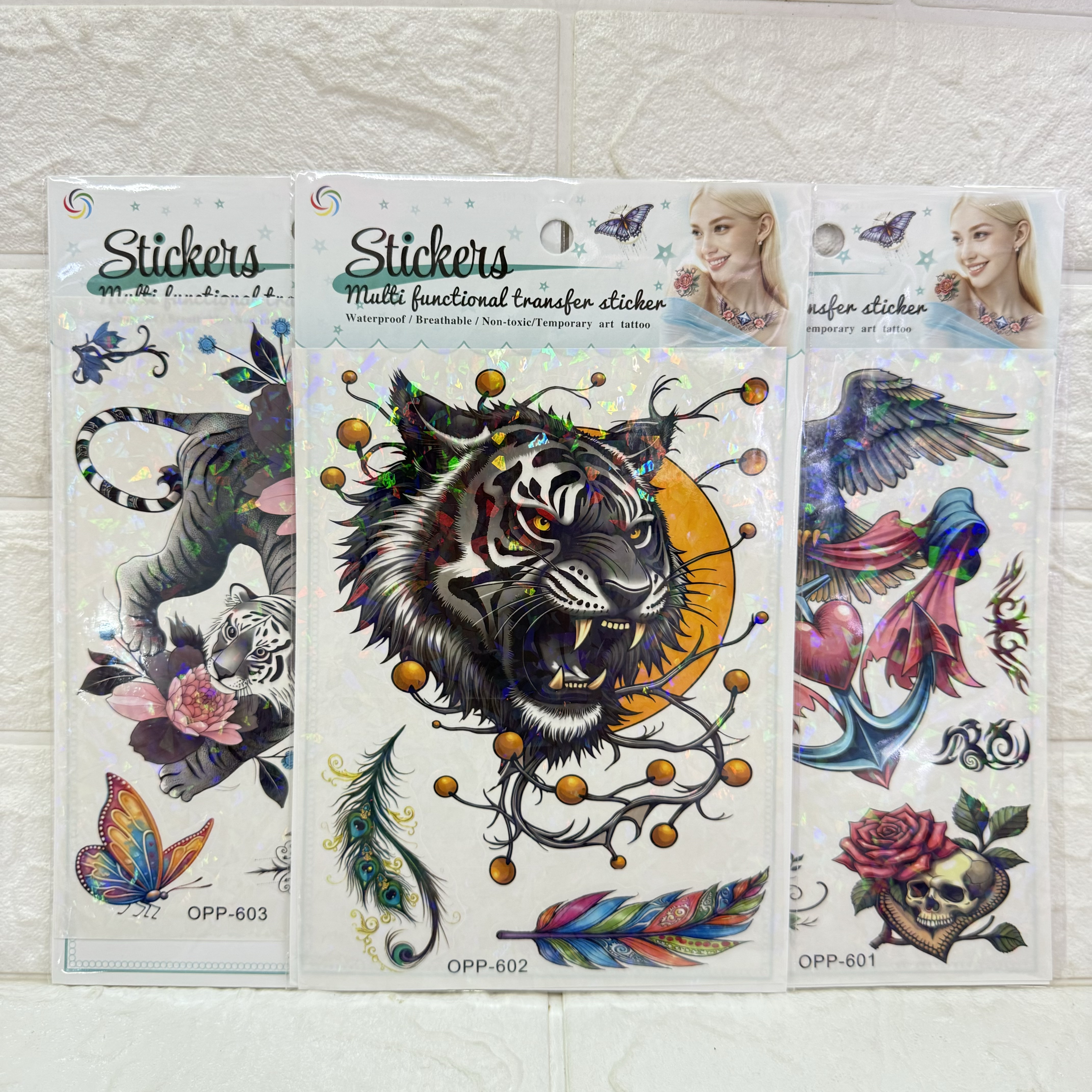 Removable laser tattoo stickers, flower, butterfly, feather, Wolf head, owl, bird tattoo stickers, fresh and cute tattoo stickers details Picture