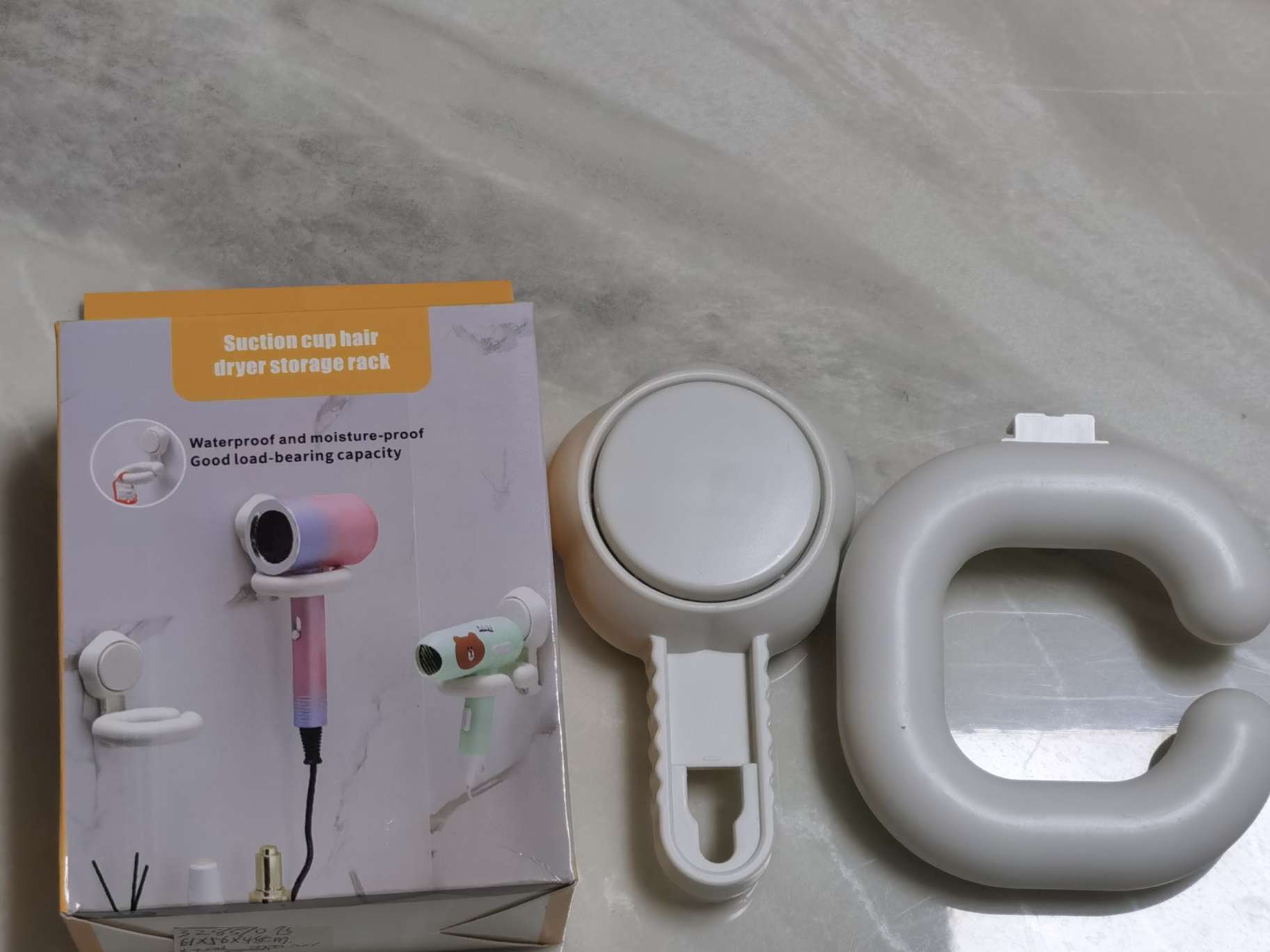 Plastic wall-mounted hair dryer rack for household bathroom and toilet without perforating suction cups Specification drawing