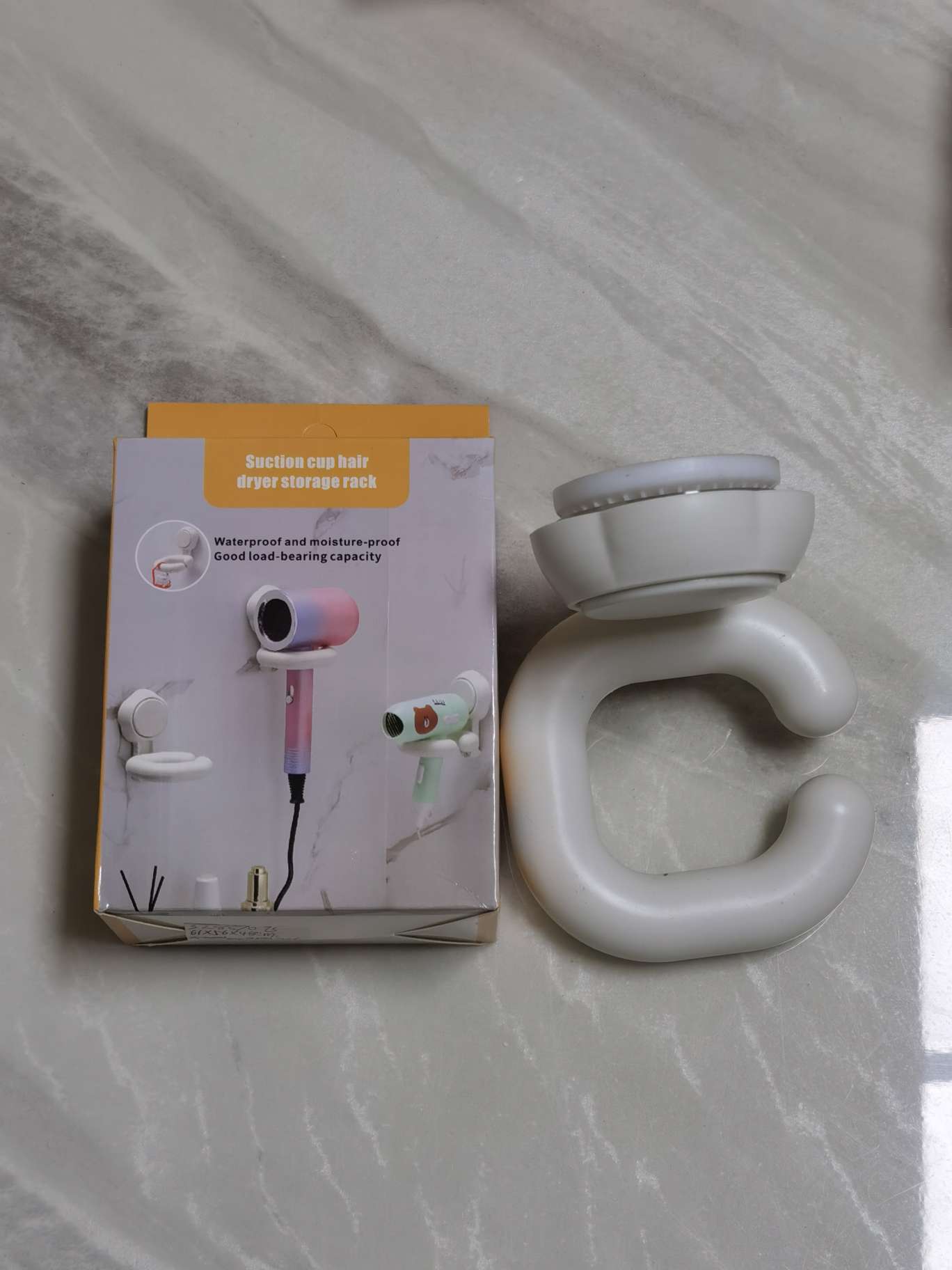 Plastic wall-mounted hair dryer rack for household bathroom and toilet without perforating suction cups Application Scenario