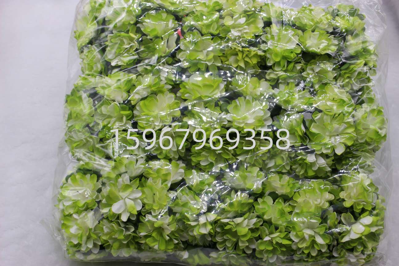Carnation artificial flowers, Christmas wreaths, artificial garden plant accessories, and creative green plant decorations enhance the working atmosphere