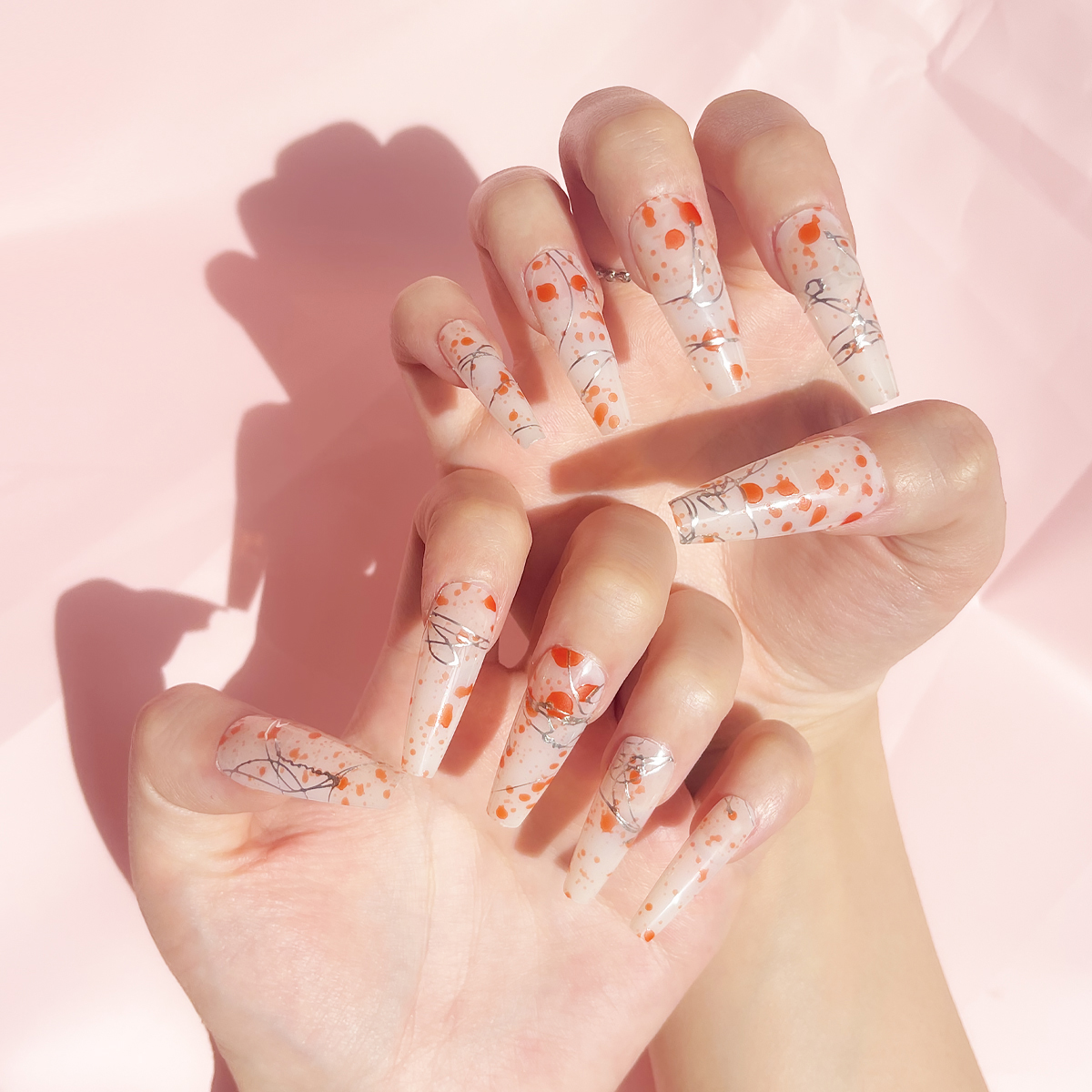 24 PCS PRESS ON NAIL TIPS LONG COFFIN SHAPE SLIVERY LINES AND ORANGE DOTS details Picture