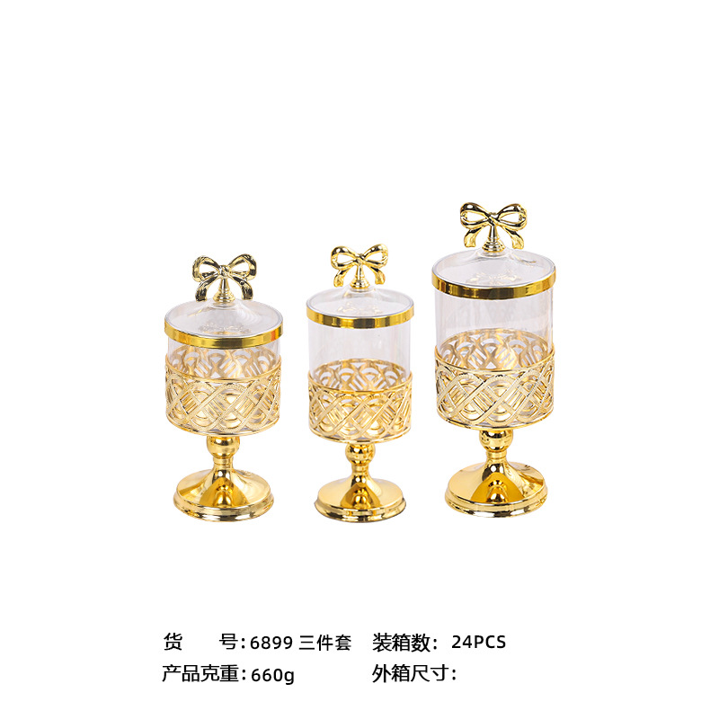 X10-6899-C foreign trade European-style transparent gold-plated candy jar with lid, gold-carved light luxury storage high-legged savings jar Item Picture