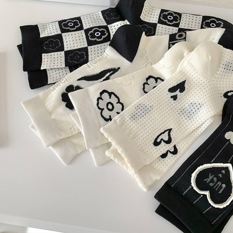 袜子女中筒袜春夏季薄款镂空网眼黑白色长袜爱心花朵日系夏天女袜