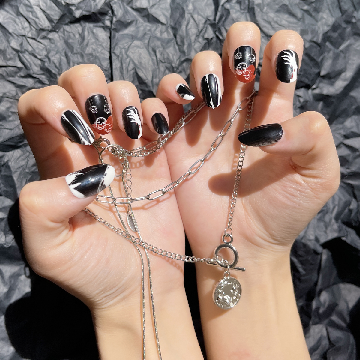 24 PCS PRESS ON NAIL TIPS OVAIL SHAPE BLACK BASE COLOR WITH SKULL PATTERN full figure