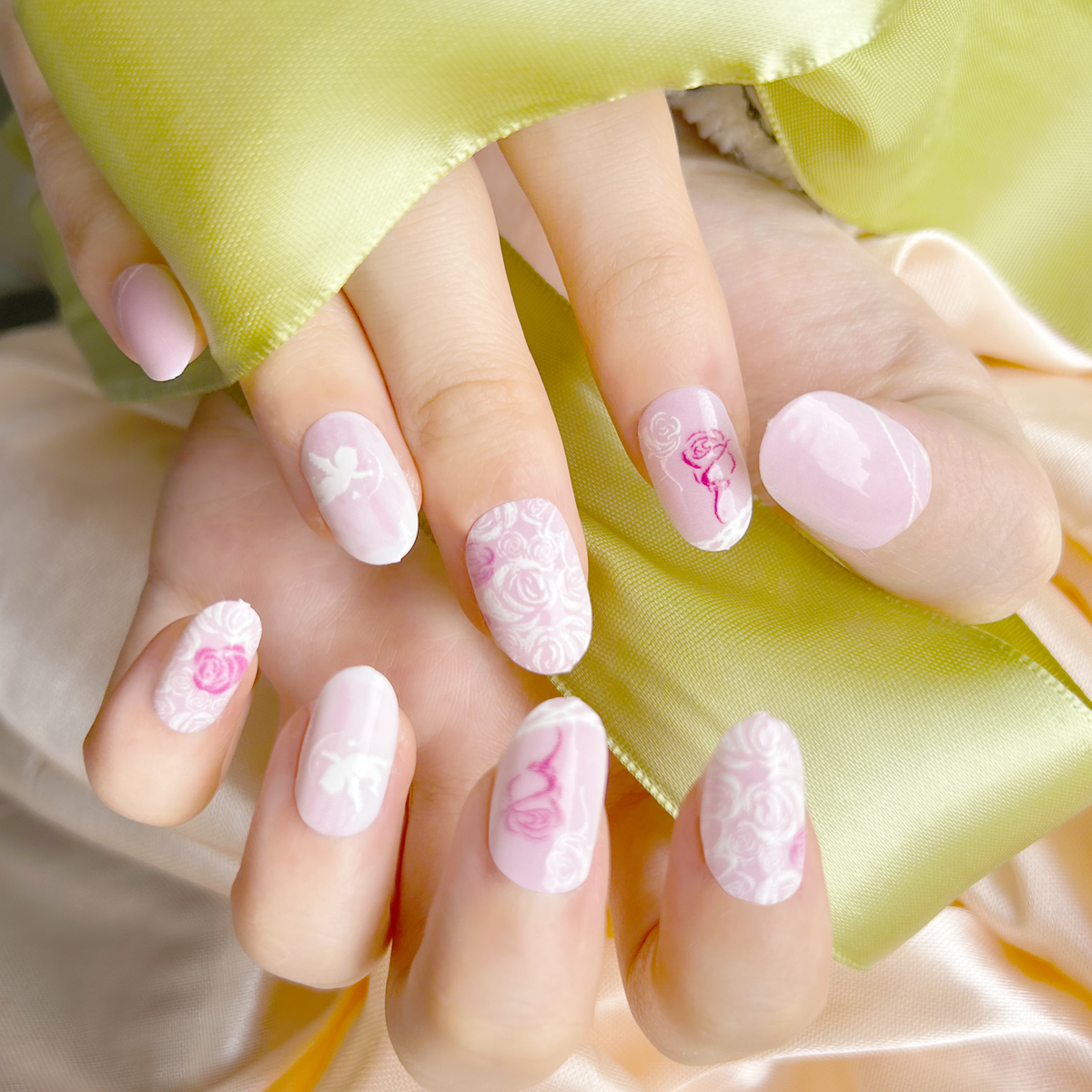 24 PCS PRESS ON NAIL TIPS OVAL SHAPE CUPID AND ROSE PATTERN Application Scenario