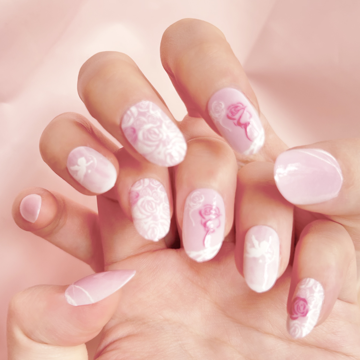 24 PCS PRESS ON NAIL TIPS OVAL SHAPE CUPID AND ROSE PATTERN undefined