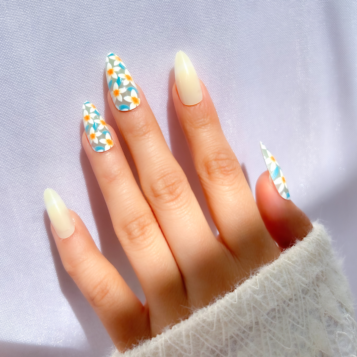 24 PCS PRESS ON NAIL TIPS ALMOND SHAPE WHITE FLOWER WITH BLUE LEAVES PATTERN details Picture