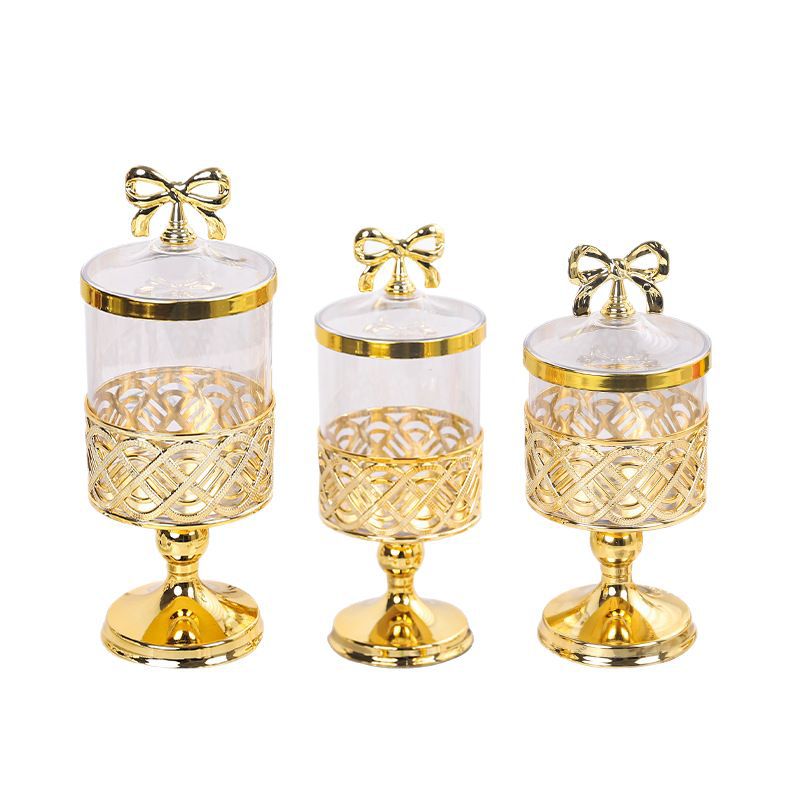 X10-6899-B Foreign trade European-style transparent gold-plated candy jar with lid, golden carved light luxury living room decoration, high-legged storage jar Specification image
