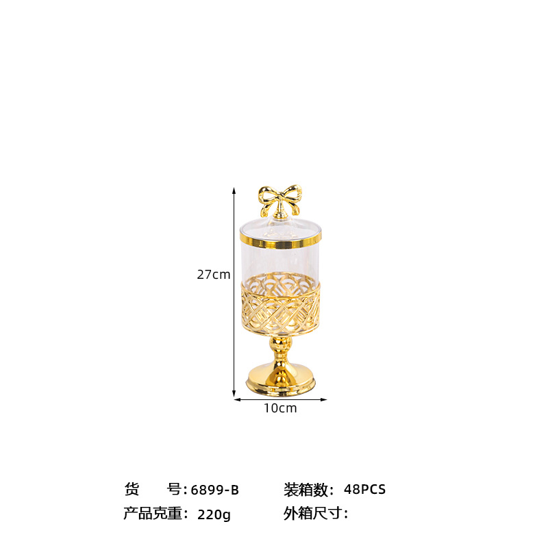 X10-6899-B Foreign trade European-style transparent gold-plated candy jar with lid, golden carved light luxury living room decoration, high-legged storage jar Application Scenario