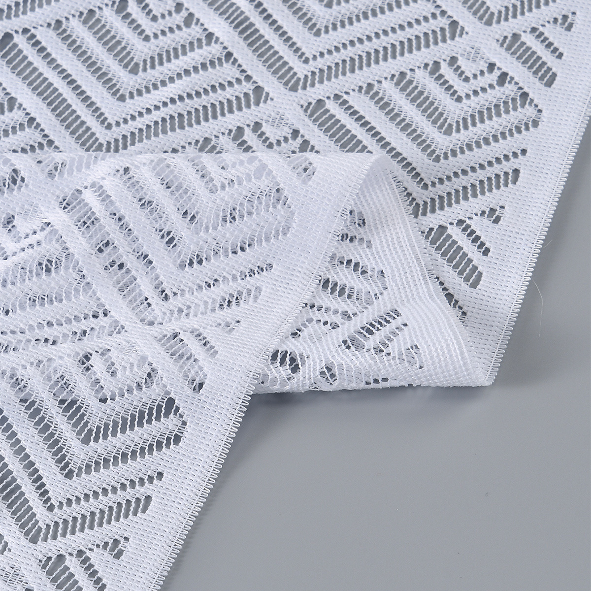 2025 New diamond-shaped perforated tassel polyester long scarf shawl fabric, foreign trade scarf fabric, fashionable outerwear shawl fabric, non-finished product Application Scenario