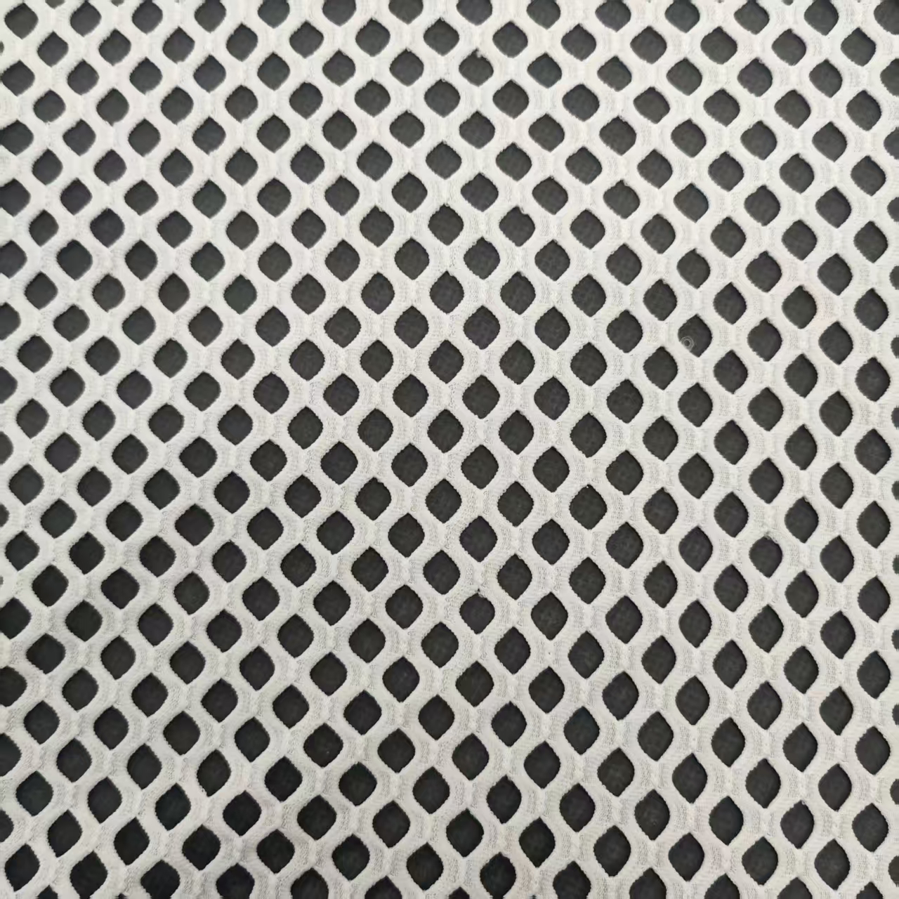 Polyester and ammonia 012 diamond-shaped mesh fabric, perforated fabric, elastic mesh fabric, hollowed-out silk stockings, fish net fabric, perforated fabric, four-sided elastic fabric, sun-protective clothing accessory material Specification image