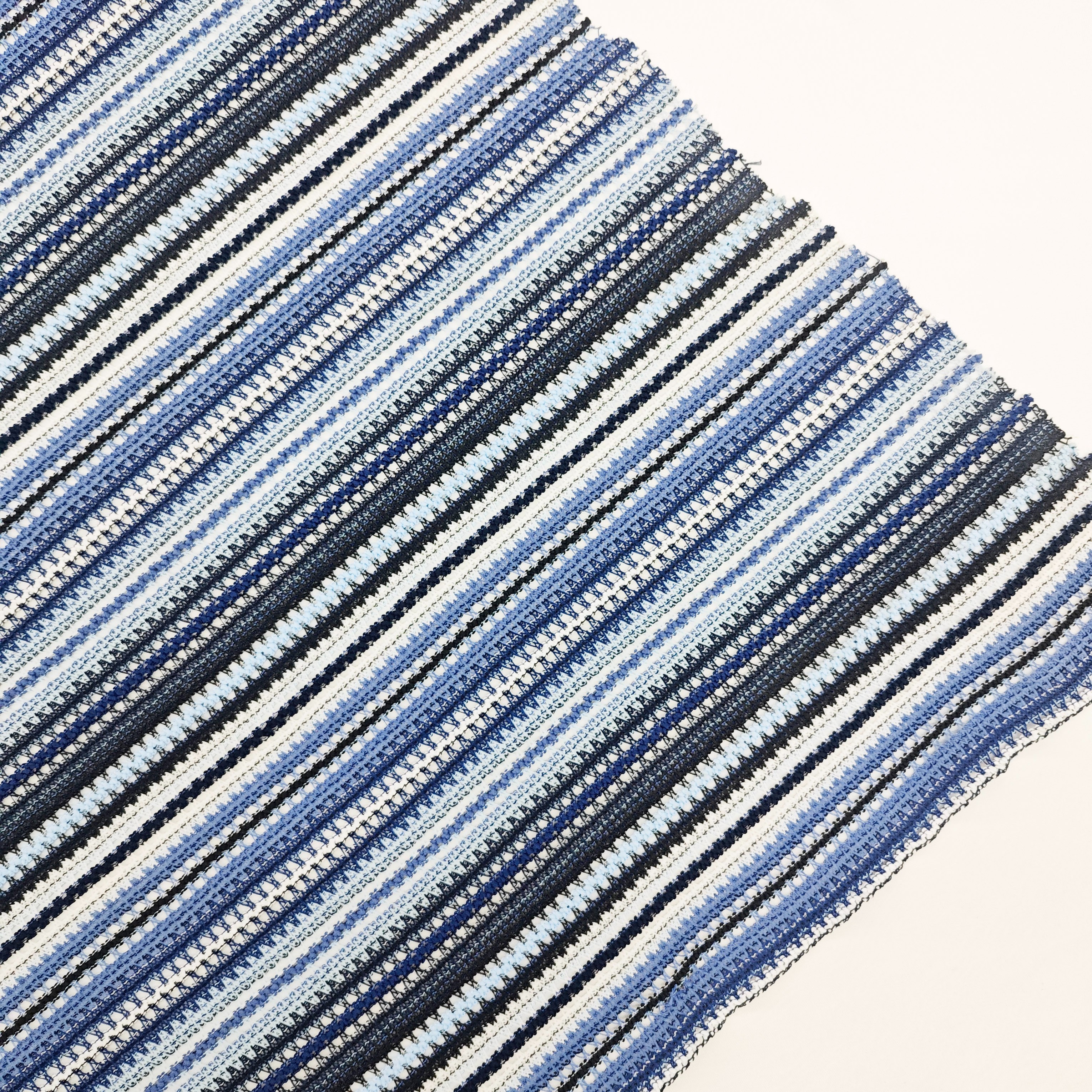 In stock: polyester striped, hollowed-out, colored, retro knitted fabric for cross-border clothing, warp knitted fabric, yarn-woven fabric, fabric and accessories for foreign trade clothing details Picture