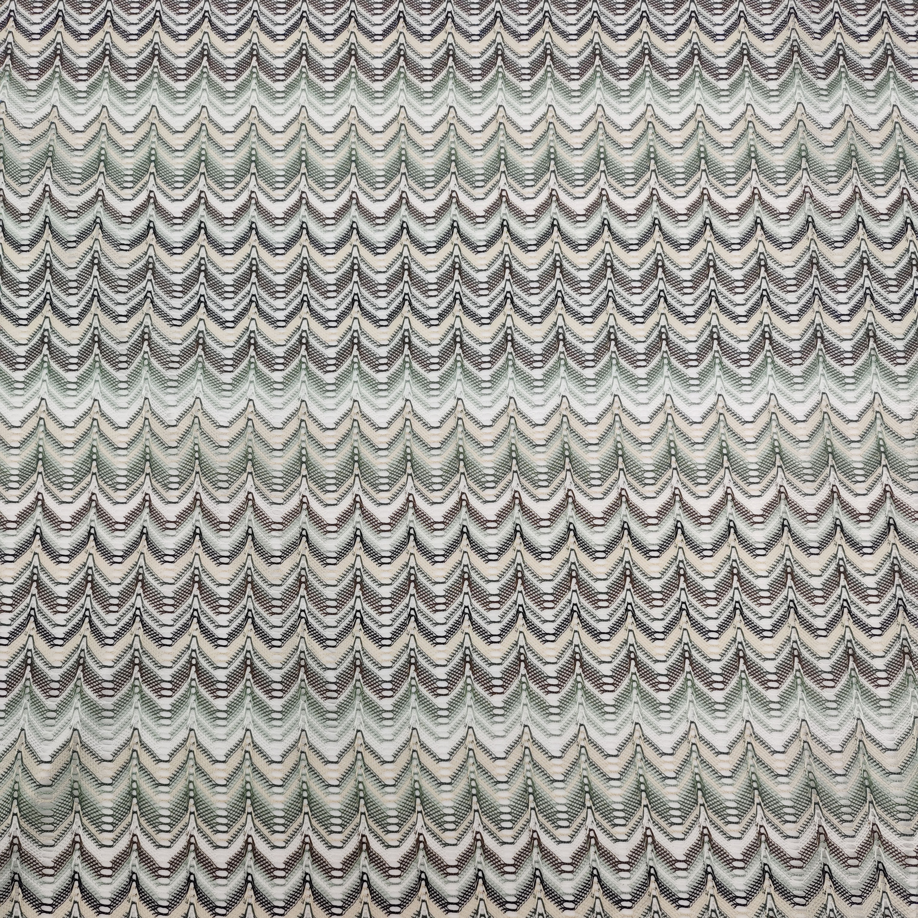 Green pure polyester warp knitted geometric cutout colored retro knitted fabric in stock, cross-border clothing fabric, Bohemian-style fabric, yarn-dyed fabric