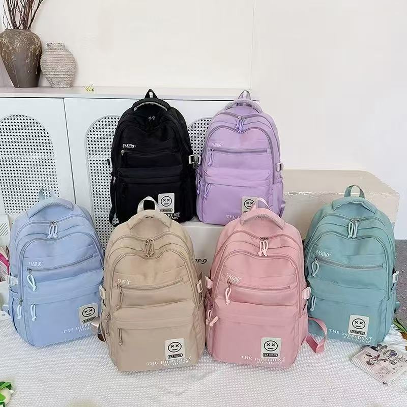 Fashionable backpacks for both boys and girls in junior and senior high school, large-capacity travel backpacks, waterproof and wear-resistant student schoolbags details Picture