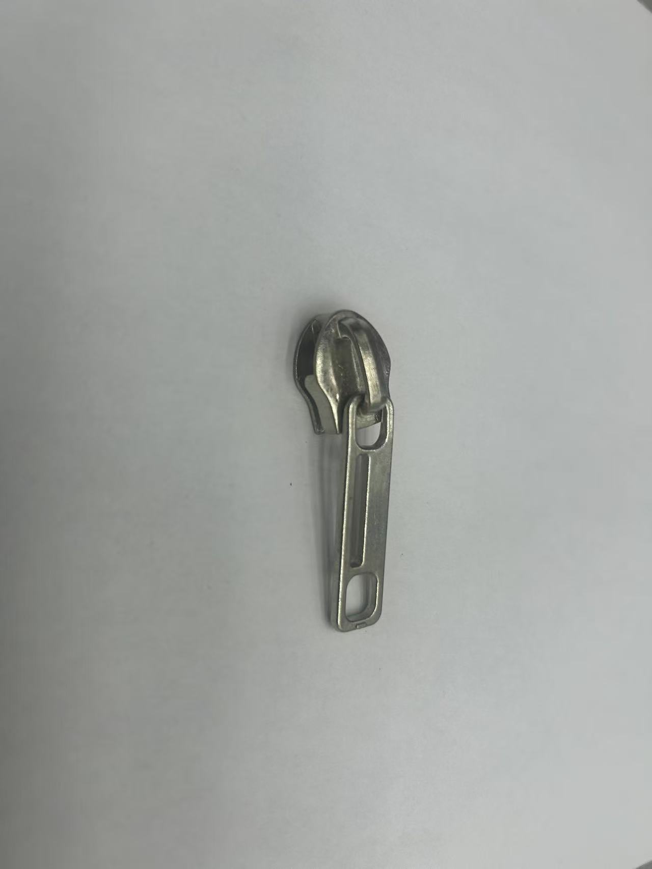 拉链/ykk拉链/铆钉/YKK拉链/YKK拉头白底实物图