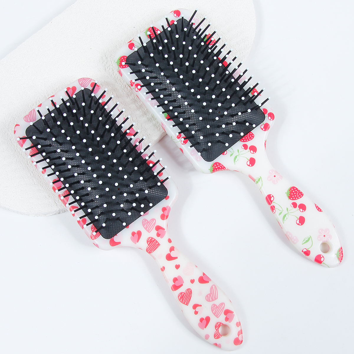 慧琳饰品新款爱心印花水转印工艺全包围按摩气垫梳，浪漫情人节完美礼物，热销全球，优质abs材质中号手持式方形气囊梳，最新型