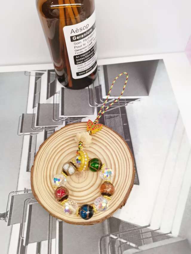 拉布布/精品手机链/饰品手机挂件/手机链/手绘珠产品图