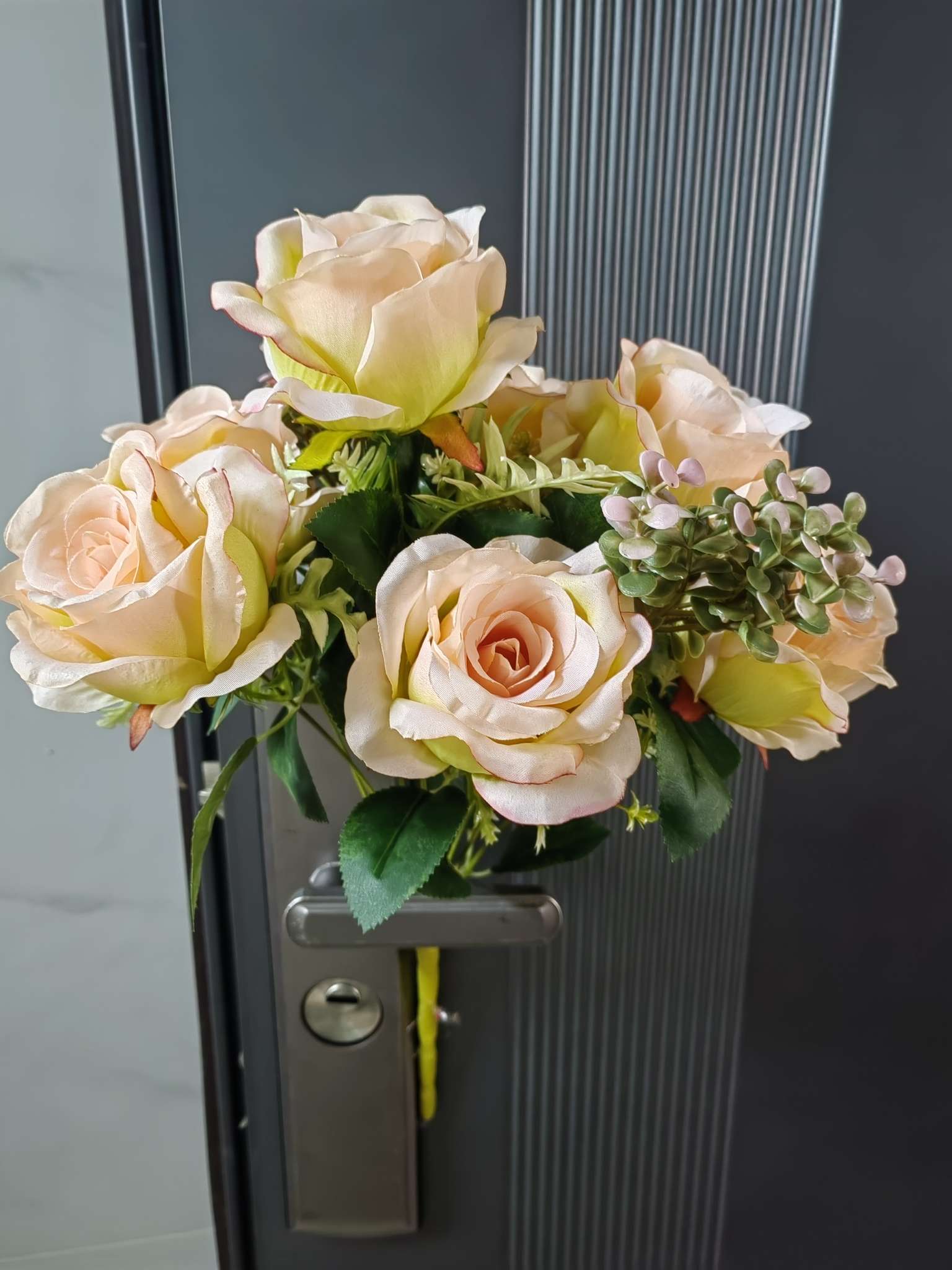 A bouquet of large roses and eucalyptus leaves detail image 1