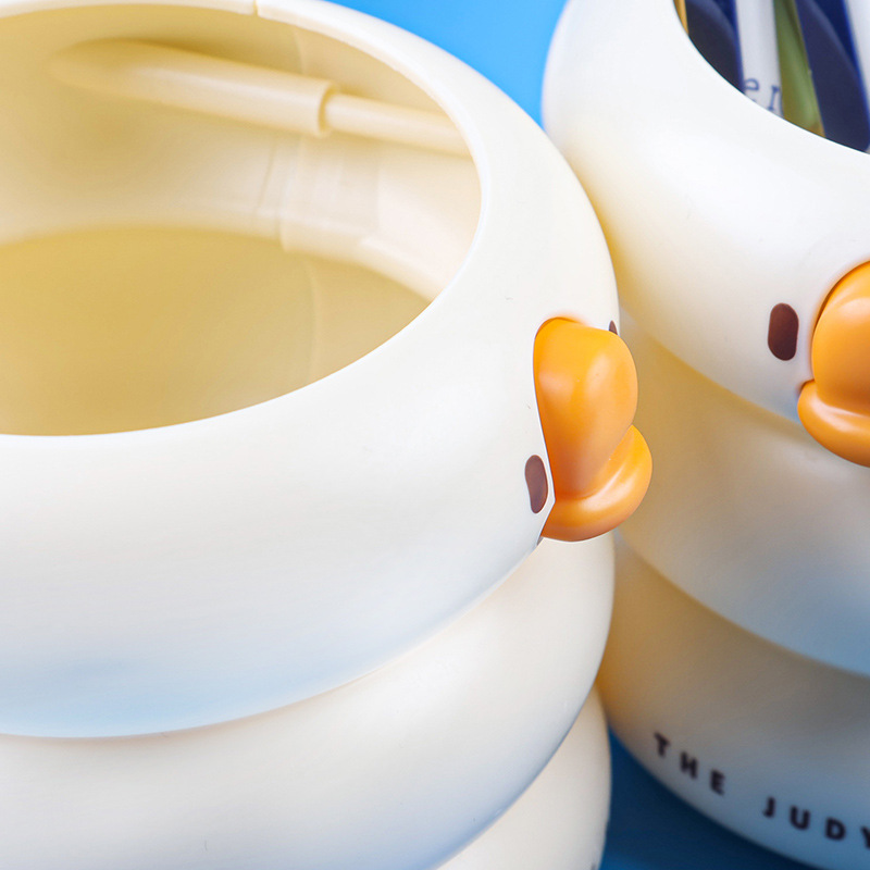 M80-6612 Creative and cute duck-shaped pen holder plastic student desktop high appearance level pen barrel Office storage box stationery Item Picture