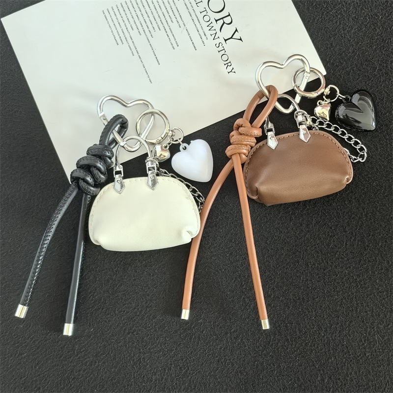 Wholesale of niche pu leather ins keychains, exquisite pendants, bags, cute gifts, accessories, best friend and couple car pendants detail image 4