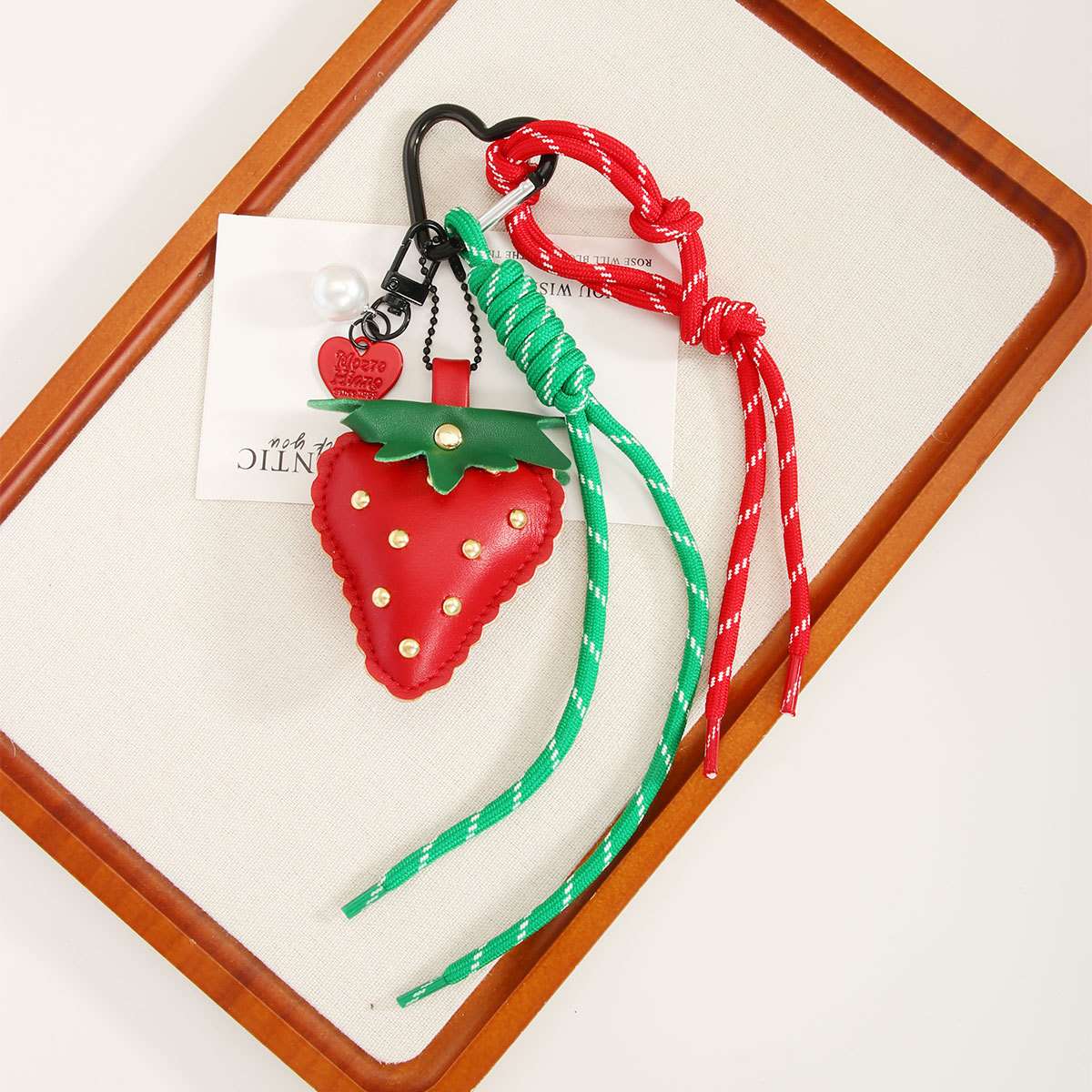 Miu-style cute leather strawberry pendant, keychain, woven rope, heart-shaped mobile phone chain, bag pendant, high-end feel detail image 2