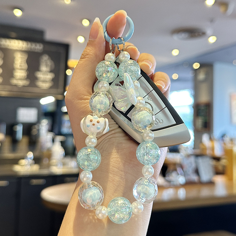 The popular beaded ice-crack butterfly mobile phone chain, car key chain accessory, women's bag key chain pendant, gift mobile phone chain, short and fashionable for women Specification image