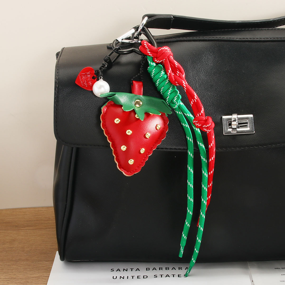 Miu-style cute leather strawberry pendant, keychain, woven rope, heart-shaped mobile phone chain, bag pendant, high-end feel detail image 4