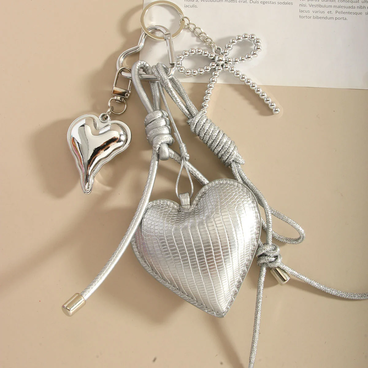 miu series original high-end silver pu heart-shaped bow woven rope bag pendant, keychain all-purpose pendant detail image 2