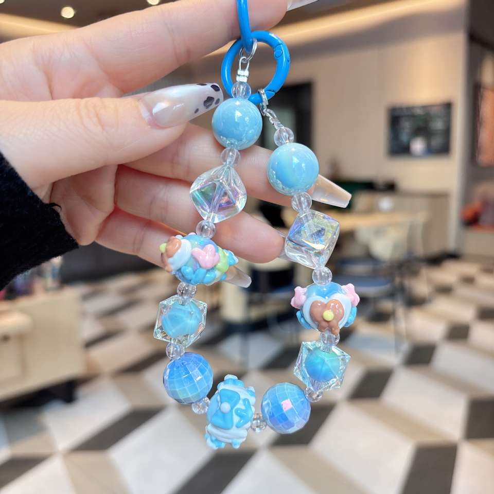 New creative beaded hand-painted dance beads, keychains, mobile phone lanyards, pendants, headphones, bags, bags, hanging decorations, best-selling batch of mobile phone chains, short styles for women, European and American style detail image 2