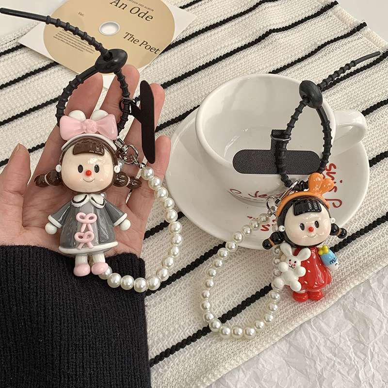 مفاتيح مفاتيح مقومة بسلاسل اللؤلؤ في أكياس صغيرة detail image 5