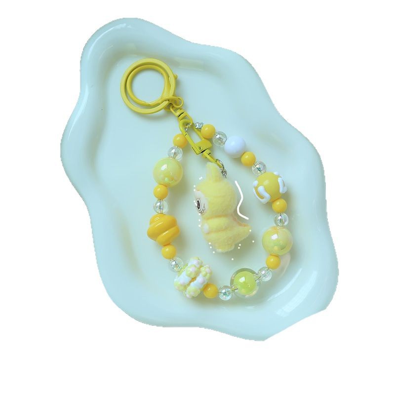 New little dinosaur labubu keychain pendant, cute silicone granule bag pendant accessory, best friend couple gift Application Scenario