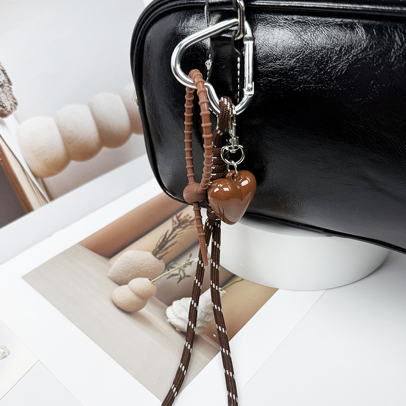 The new woven rope keychain pendant is simple and versatile. It is a MIU-style bag accessory and a short mobile phone lanyard Specification image