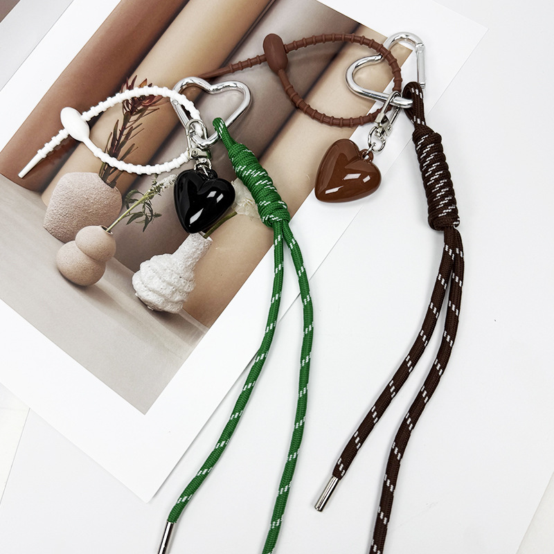 The new woven rope keychain pendant is simple and versatile. It is a MIU-style bag accessory and a short mobile phone lanyard detail image 4