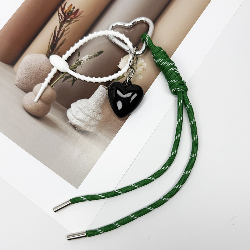 The new woven rope keychain pendant is simple and versatile. It is a MIU-style bag accessory and a short mobile phone lanyard detail image 2